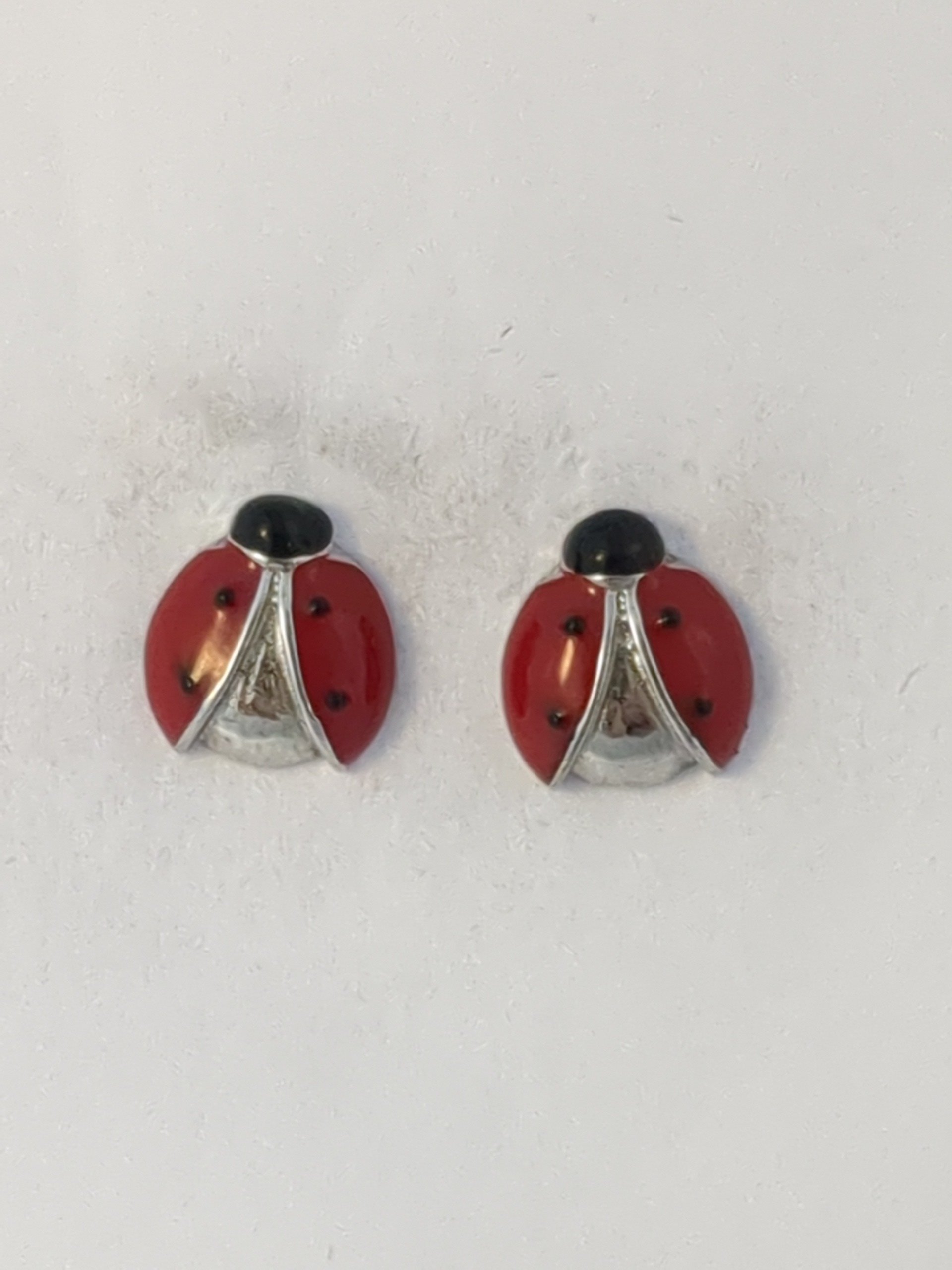 Silver ladybug stud earrings