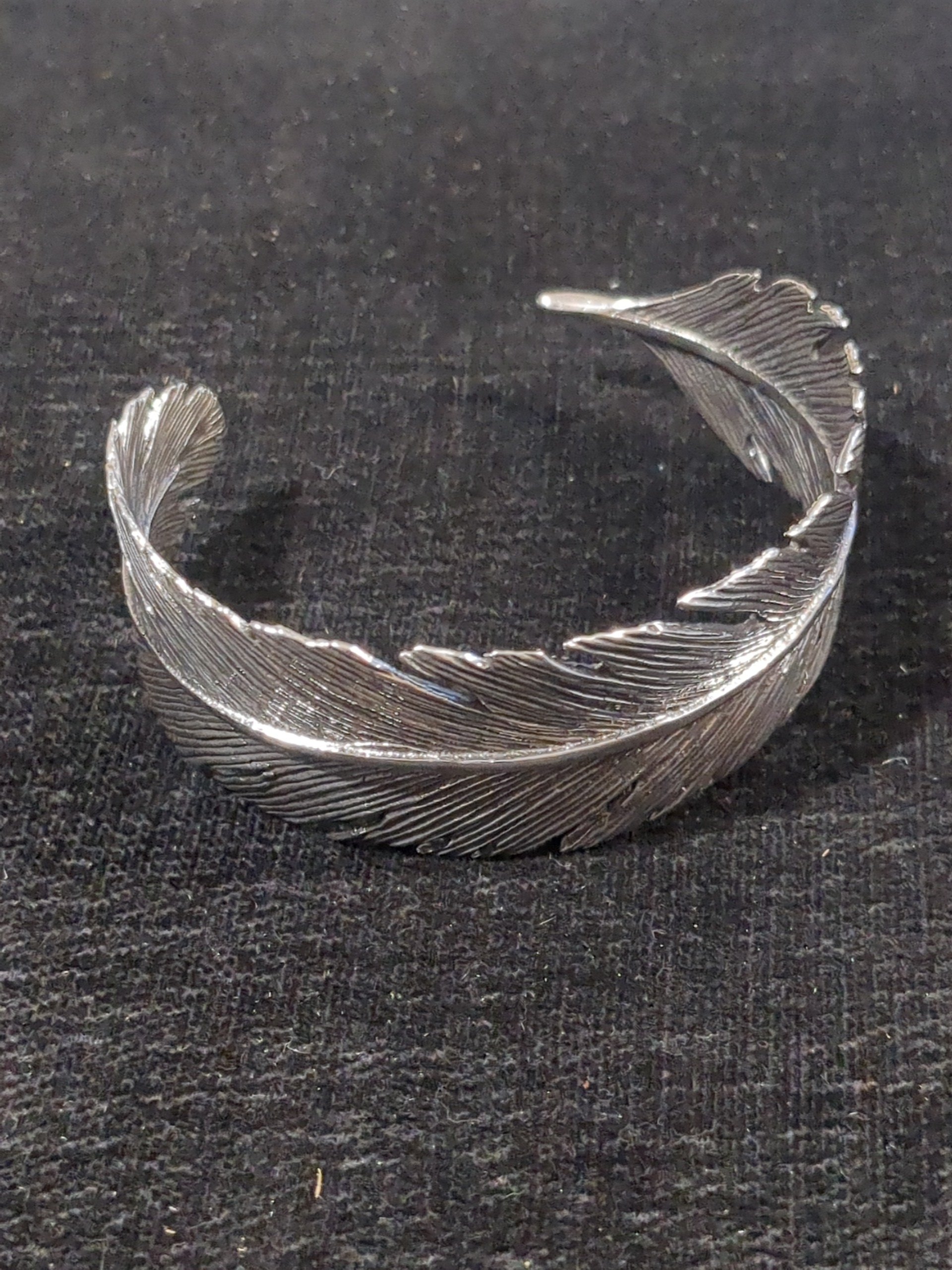 Silver feather bangle