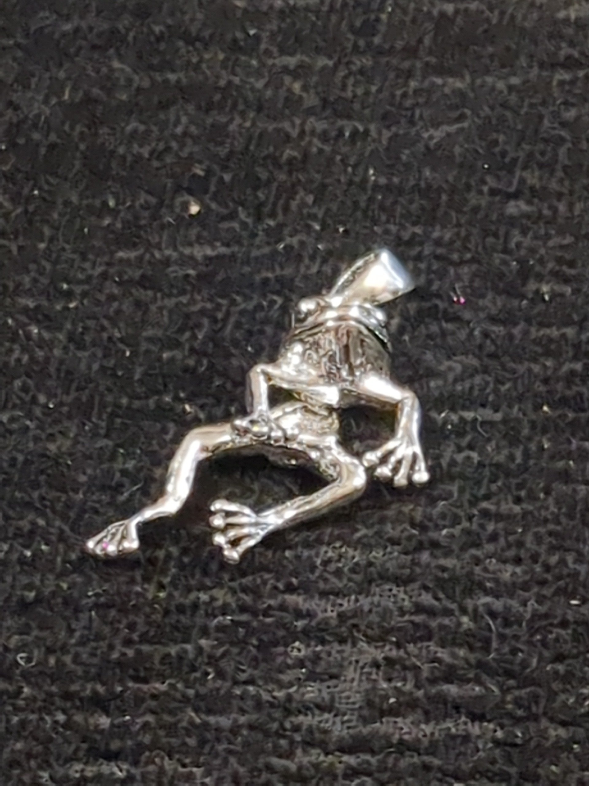 Silver dancing frog pendant