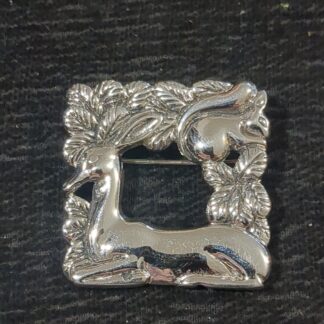 silver deer and squirrel brooch