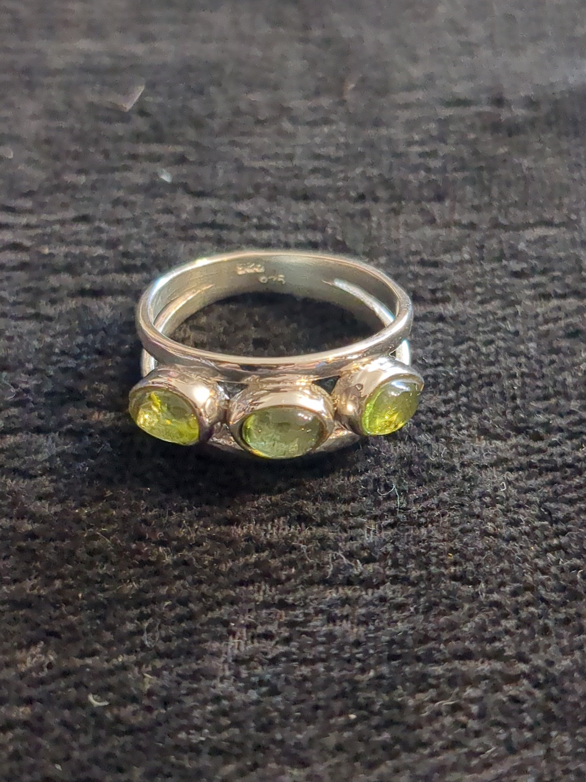 Silver peridot three stone ring
