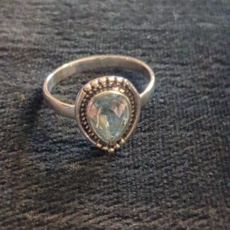 Silver blue topaz ring