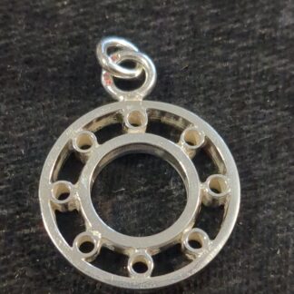Silver faux bearing pendant