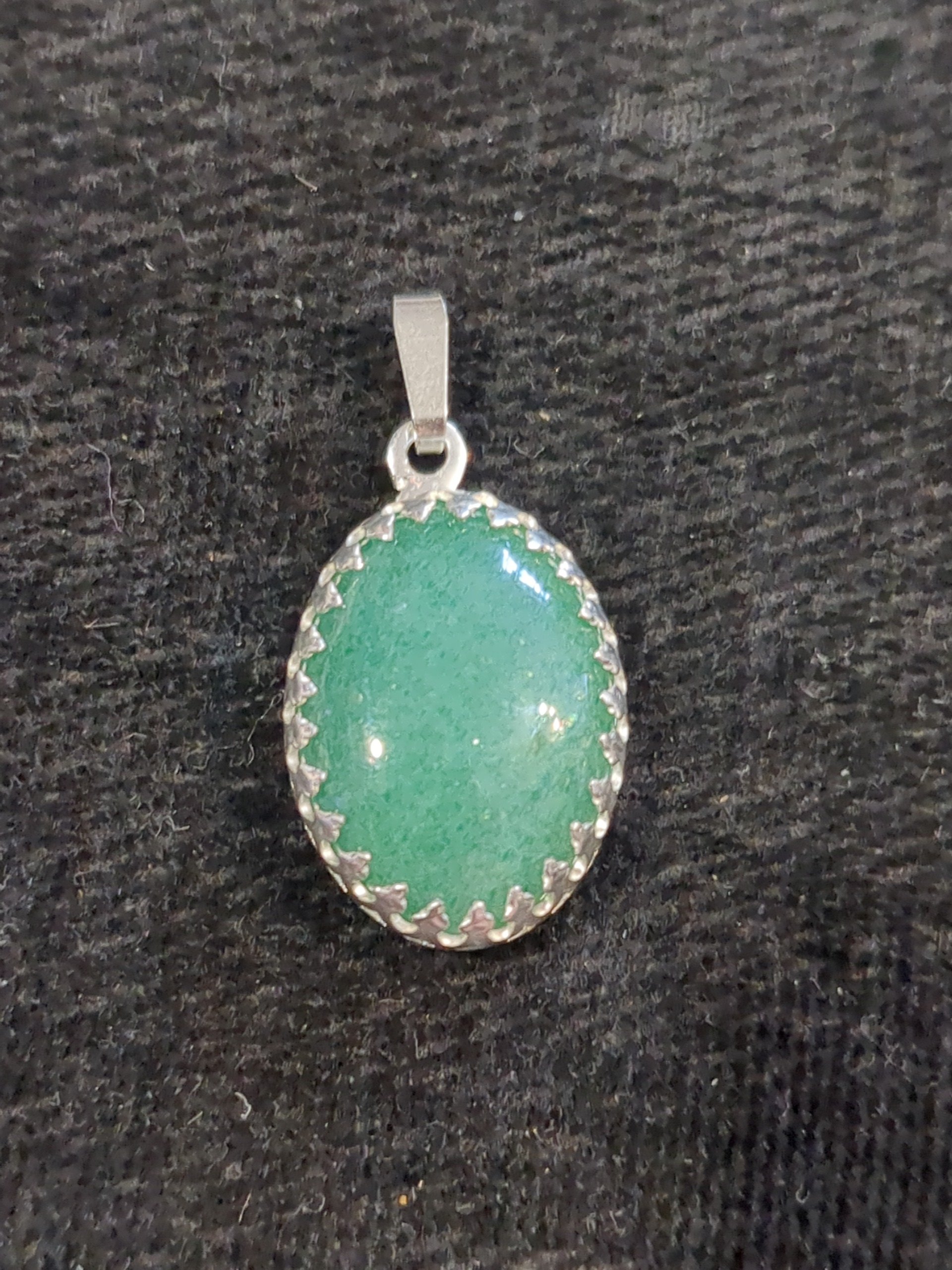 Silver pendant green stone