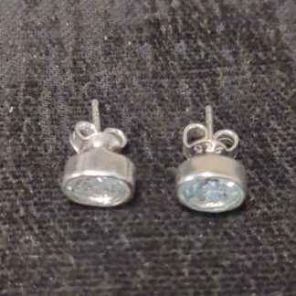 Silver oval blue topaz studs