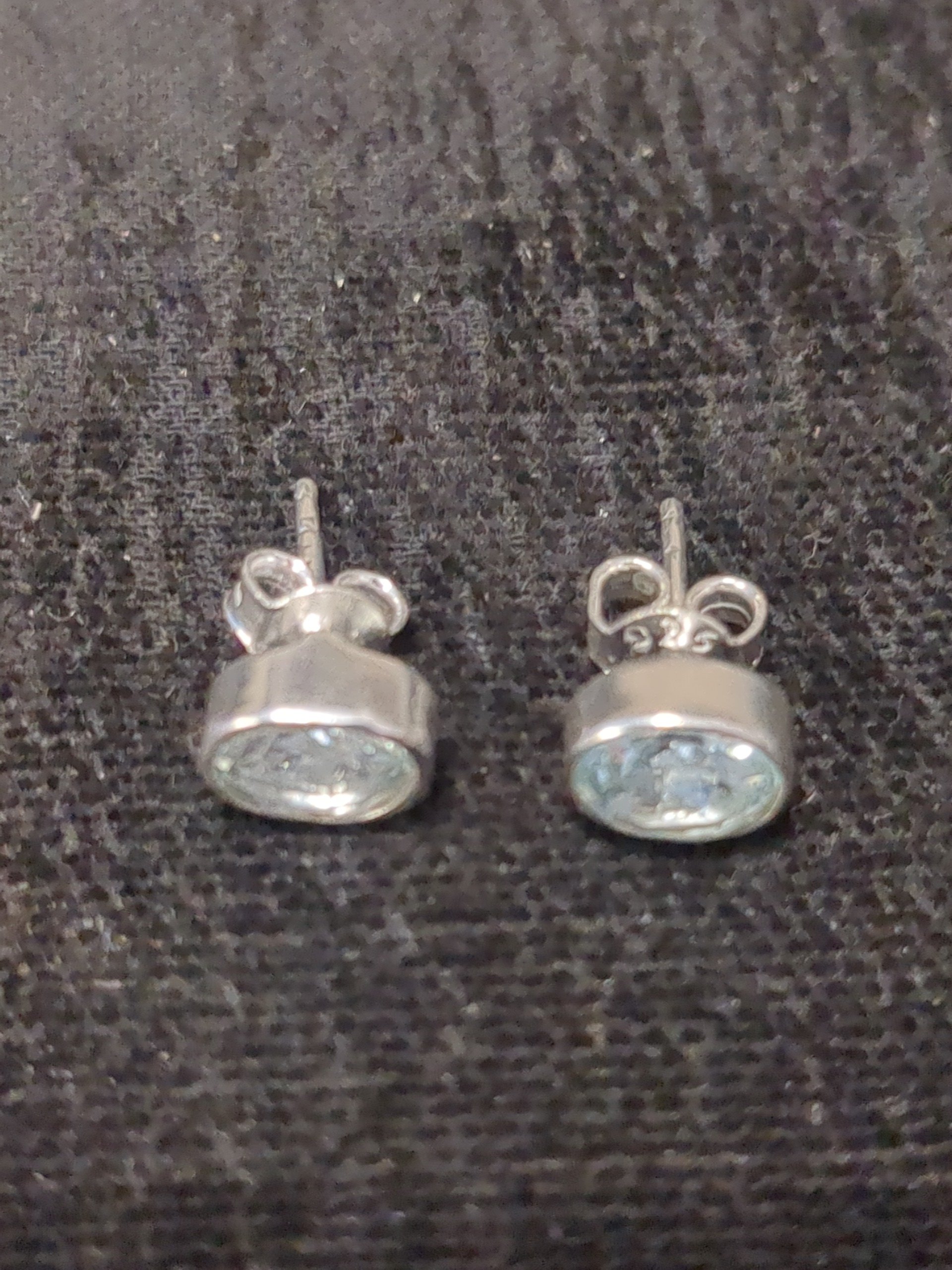 Silver oval blue topaz studs