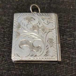 Silver book locket