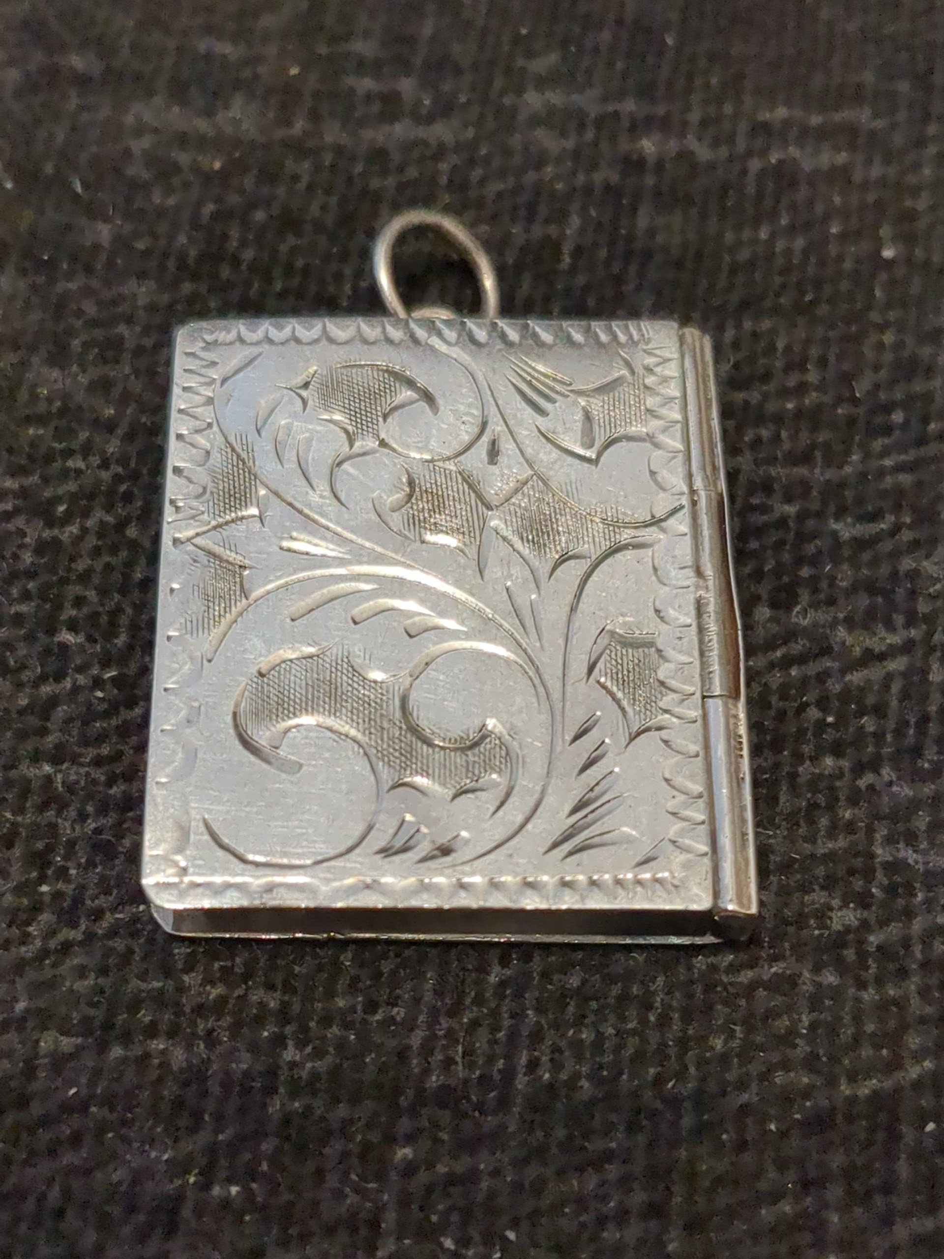 Silver book locket