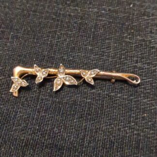 9ct Gold and pearl riding crop brooch