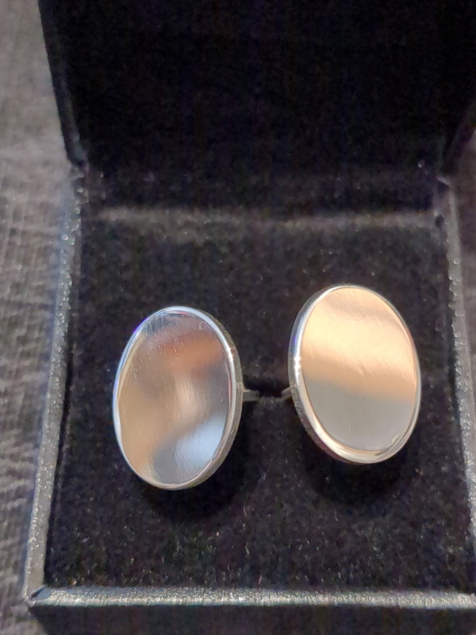 Silver oval cufflinks