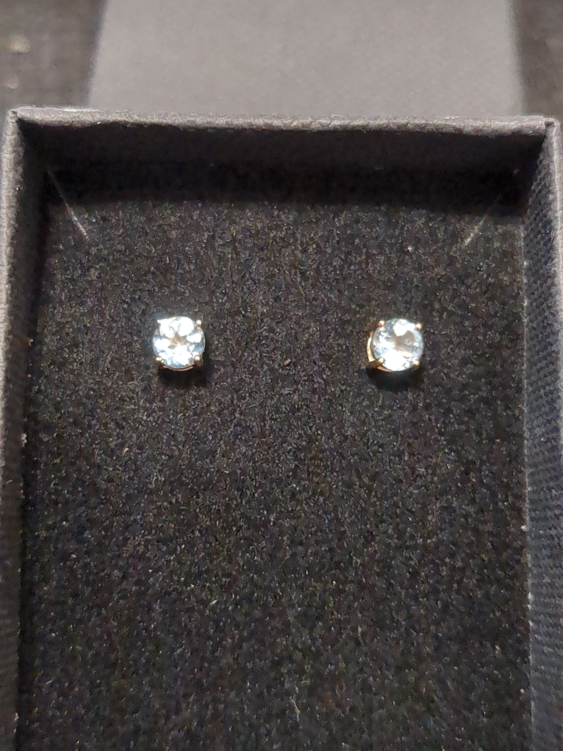 9ct Gold sky blue topaz studs
